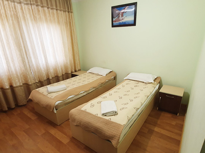 Kok Bel Motel - slaapkamer met 2 bedden